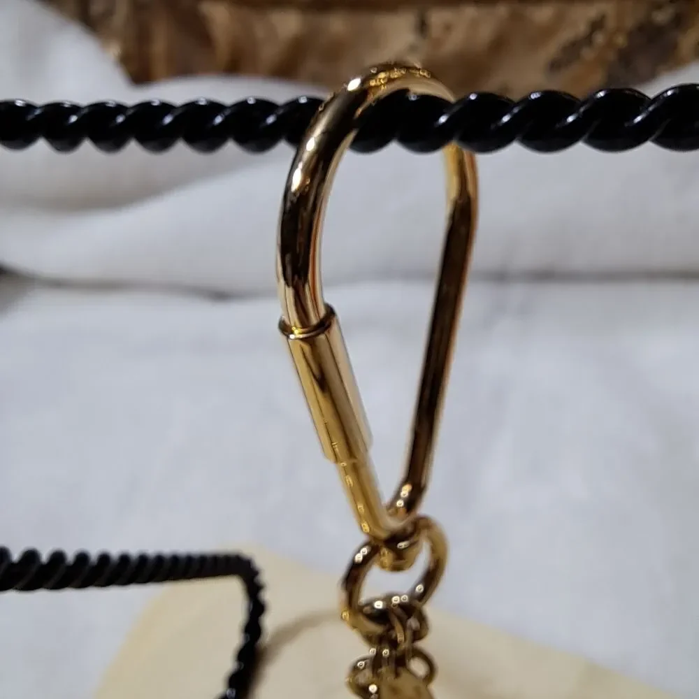 AUTHENTIC Louis Vuitton Puzzle Keyring with dustbag. NEW CONDITION